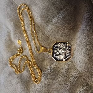 Joan Rivers Pendent. 16 inch chain. Gold